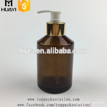 Wholesale empty flat shoulder amber color glass body lotion bottle